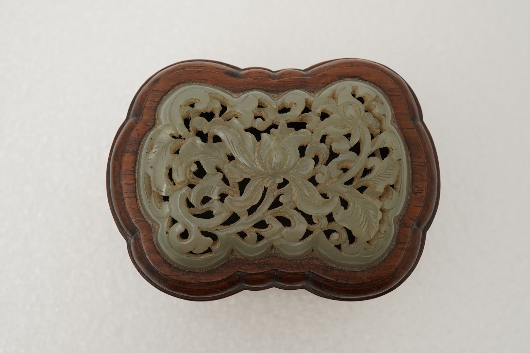 A Chinese jade mounted huanghuali box and cover, 19th century